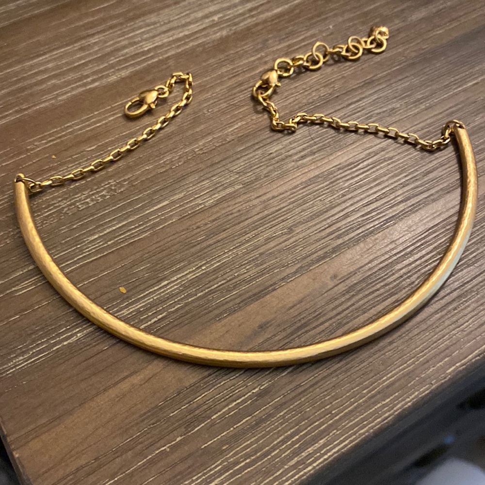 Brighton choker with extender and three charms all gold color